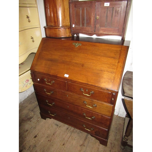 1668 - Oak bureau, the fall front enclosing a fitted interior above two short and three long graduated draw... 