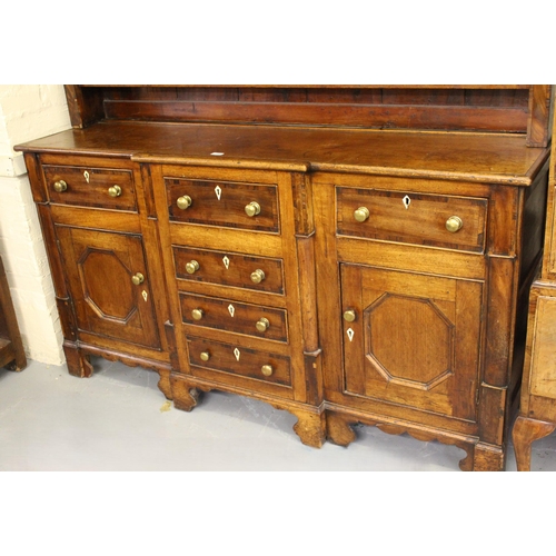 1689 - Early 19th Century elm and mahogany dresser, the boarded shelf back above a breakfront with moulded ... 