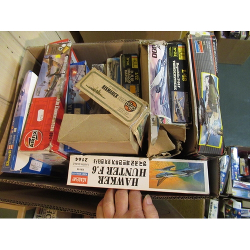 169 - Four boxes containing a quantity of unbuilt model aircraft kits, including Airfix, Italeri and Tamiy... 