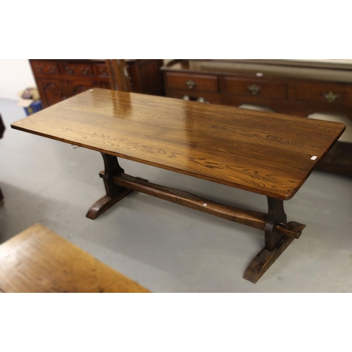 1690 - Reproduction oak refectory style dining table on slab end supports, 214 x 88cm, together with a matc... 