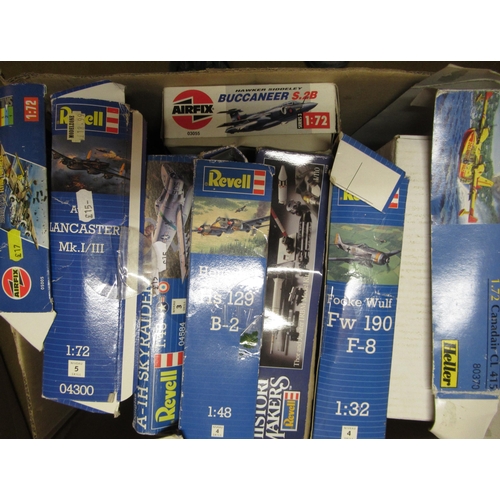 173 - Four boxes containing a quantity of unbuilt model aircraft kits, including Airfix, Italeri and Tamiy... 