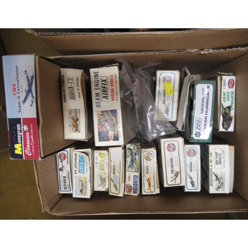 173 - Four boxes containing a quantity of unbuilt model aircraft kits, including Airfix, Italeri and Tamiy... 