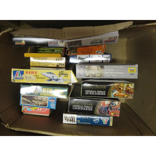 173 - Four boxes containing a quantity of unbuilt model aircraft kits, including Airfix, Italeri and Tamiy... 