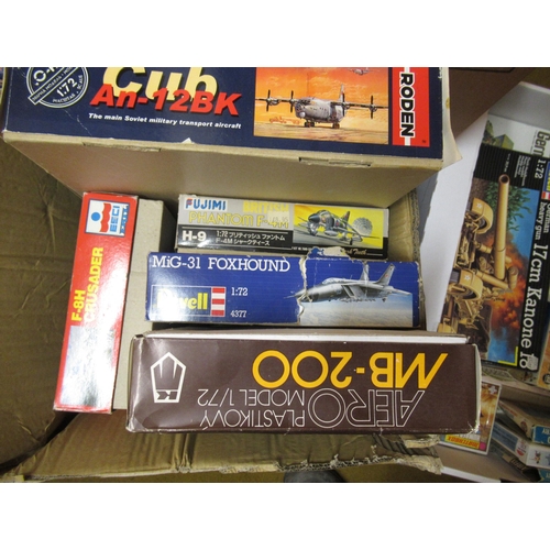 176 - Six boxes containing a quantity of unbuilt model aircraft kits, including Airfix, Revel etc. (some b... 