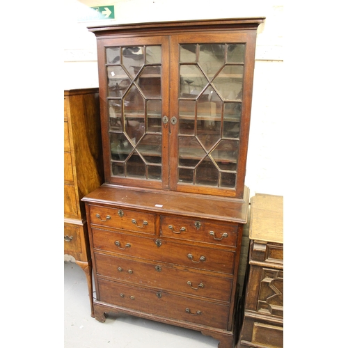 1807 - George III mahogany bookcase, the moulded cornice above a pair of astragal doors enclosing shelves, ... 