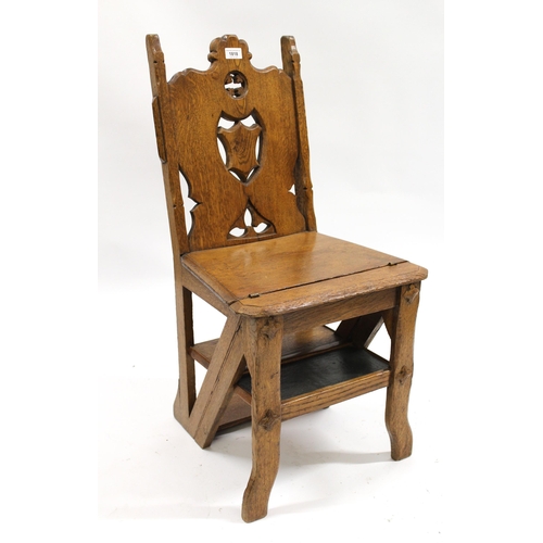 1818 - 19th Century oak metamorphic library step / chair having pierced carved shield shaped back, on shape... 