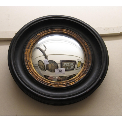 1826 - Circular reproduction ebonised and gilt convex  wall mirror, 40cm diameter, together with an early 2... 