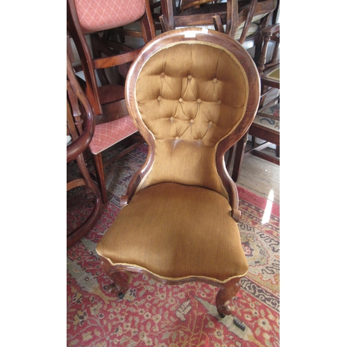 1837 - Victorian mahogany and button upholstered drawing room chair, together with a similar low seat nursi... 