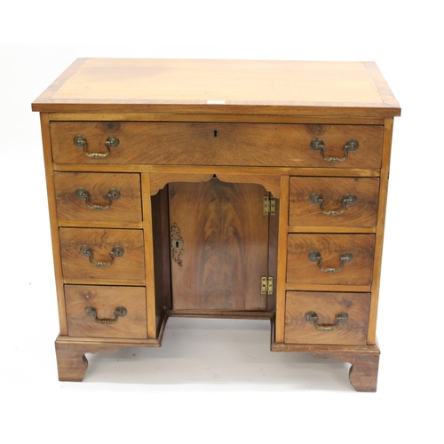 1838 - Early 20th Century mahogany kneehole desk in George III style, the crossbanded top above seven drawe... 