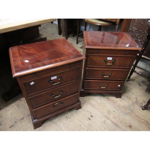 1852 - Pair of reproduction mahogany three drawer bedside cabinets, each with a pull-out slide and ogee bra... 