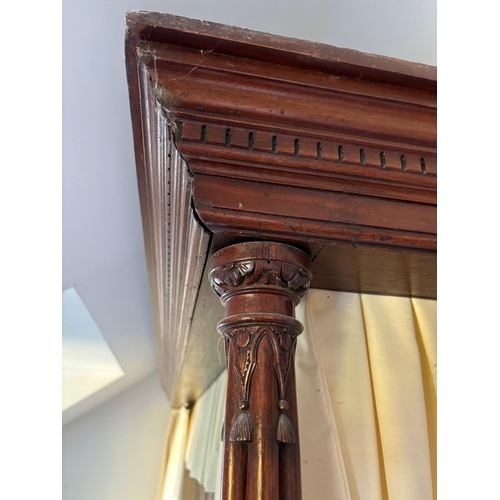 1853 - Mahogany four poster bed, the canopy with a moulded dentil cornice above cluster column foot posts, ... 