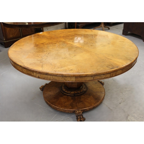 1855 - Victorian circular walnut tilt top centre table, on baluster column and circular platform base with ... 