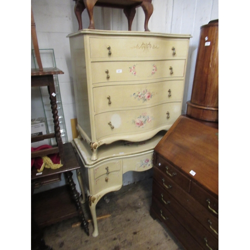 1877 - Mid 20th Century cream and floral decorated serpentine fronted four drawer chest, together with a ma... 