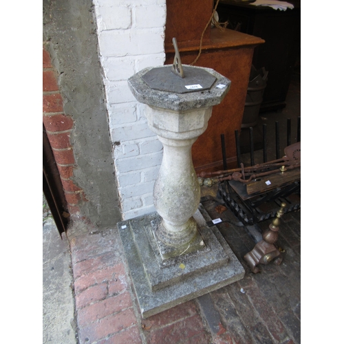 1878 - Weathered reconstituted stone garden sundial on a baluster column (at fault)