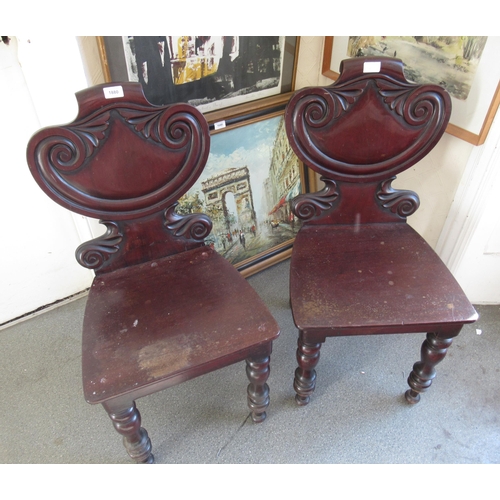 1880 - Pair of Victorian mahogany shield back hall chairs with panel seats on turned supports