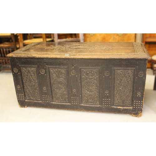 1896 - Large antique oak four panel coffer with later carved decoration and original iron loop handles, 143... 