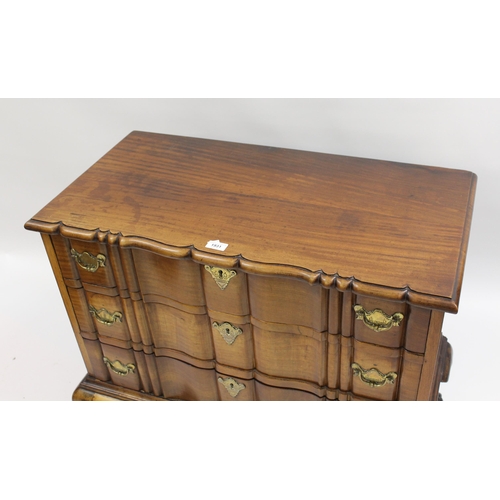 1931 - Continental block front chest of three shaped drawers above shaped frieze, on cabriole claw and ball... 