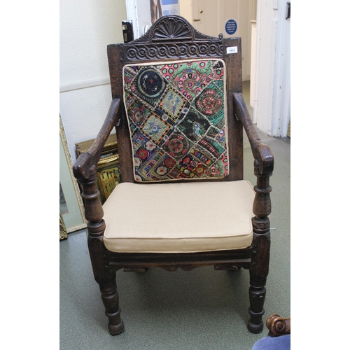 1933 - Antique oak Wainscott chair with a panel back and plank seat on turned supports