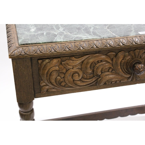 1934 - Late 19th / early 20th Century Continental oak serving table with a marble inset top above a carved ... 