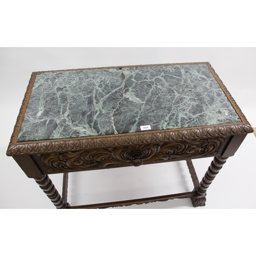 1934 - Late 19th / early 20th Century Continental oak serving table with a marble inset top above a carved ... 