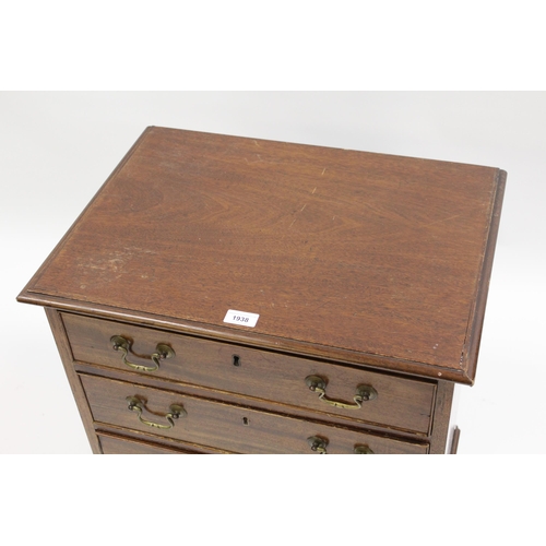 1938 - Mahogany dwarf chest in George III style, with four long drawers and brass handles, raised on bracke... 