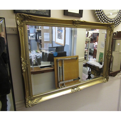 1981 - 20th Century rectangular gilt composition wall mirror, 75 x 105cm