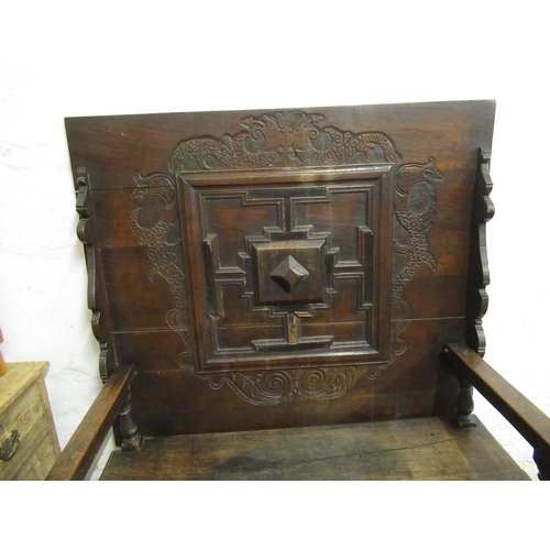 1991 - 19th Century Continental oak monks bench / table, the fold-over top on a panelled seat and carved fr... 