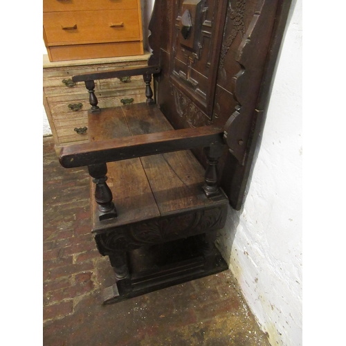 1991 - 19th Century Continental oak monks bench / table, the fold-over top on a panelled seat and carved fr... 