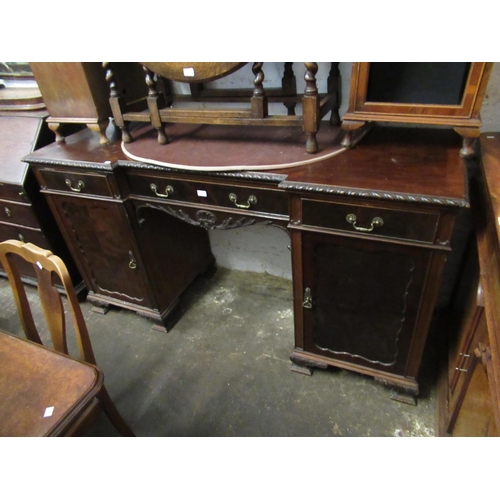 1993 - Edwardian mahogany inverted breakfront sideboard, with three drawers above two pedestal doors, raise... 