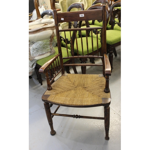 1994 - Arts & Crafts beechwood open arm chair with spindle back, together with various rush seated chairs, ... 