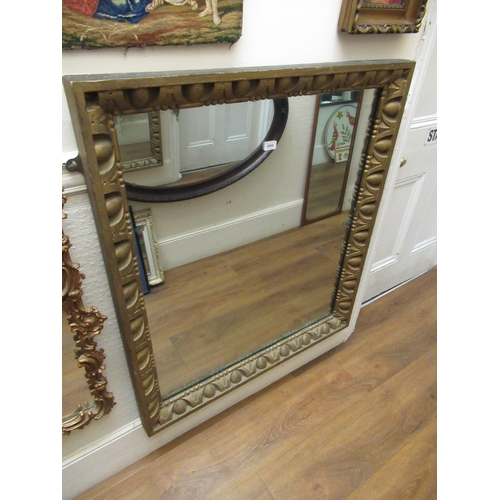 2009 - 19th Century rectangular gilt framed wall mirror, with heavily carved gadroon decoration and origina... 