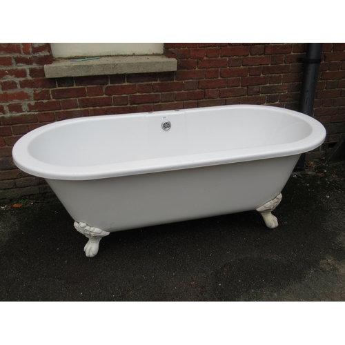 2010 - Large roll top bath on cabriole claw and ball supports