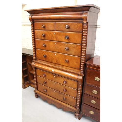 19th Century Scottish mahogany chest on chest, the moulded cornice above two short and six long drawers flanked by bobbin turned side columns, above a shaped frieze on turned supports, 124cm wide x 57cm deep x 207cm high