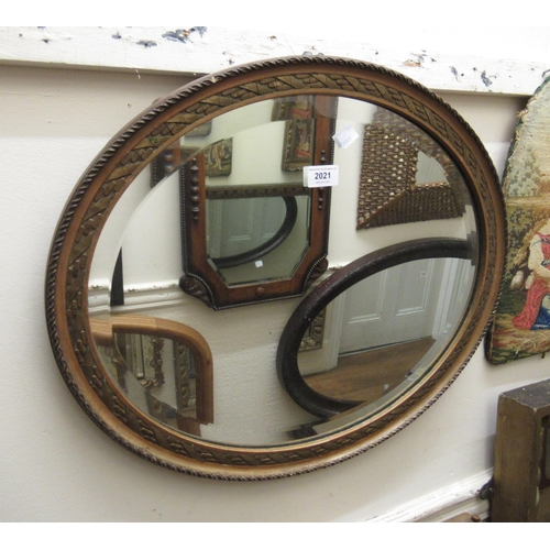 2021 - Small oval gilt framed bevelled edge wall mirror, small gilt framed cartouche shaped wall mirror, an... 