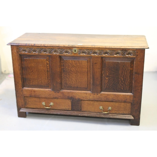 2032 - George III oak mule chest, the triple plank lid enclosing a lidded candle box, the sides and back pa... 