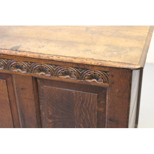 2032 - George III oak mule chest, the triple plank lid enclosing a lidded candle box, the sides and back pa... 