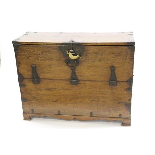 2037 - Antique Oriental iron mounted elm storage box having hinged fall front on a later pine base, retaini... 