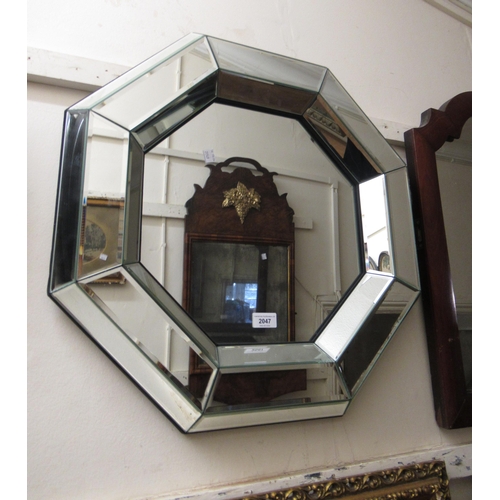 2047 - Reproduction octagonal wall mirror together with a reproduction circular metal framed wall mirror