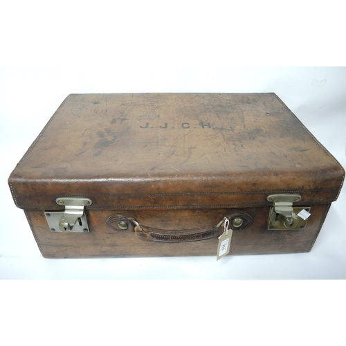 215 - Heavy leather suitcase with brass locks and partially fitted interior, 60 wide x 40cm deep x 22cm hi... 