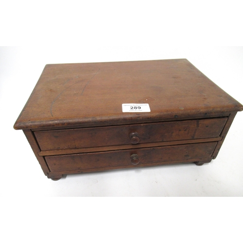 289 - Small mahogany two door table cabinet containing a collection of various 19th Century wooden mother ... 