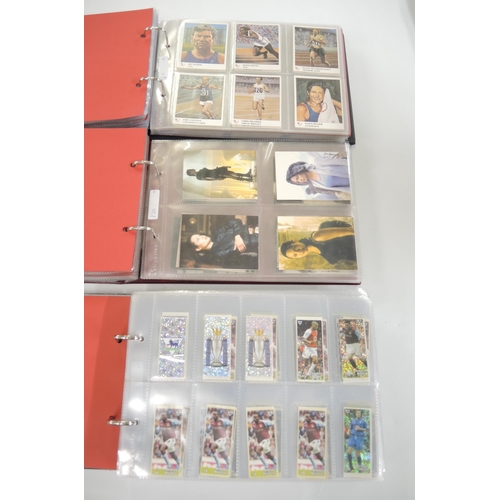 301 - Five albums of trading cards, including Magic Box, Dunkin stickers etc.