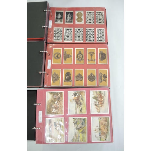 303 - Five albums of Players cigarette cards