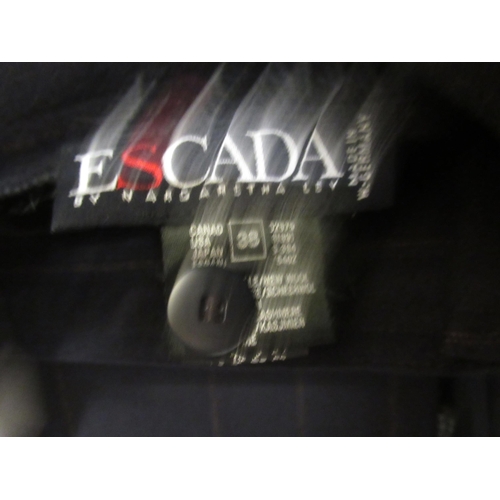 31 - Escada pin stripe double breasted jacket, size 38, together with a pair of matching trousers and sho... 