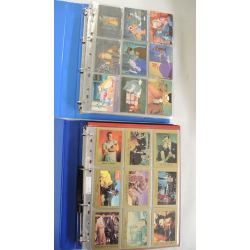 317 - Eight albums of trading cards, including Merlin battle cards, Daily Mirror cards, Cardz etc