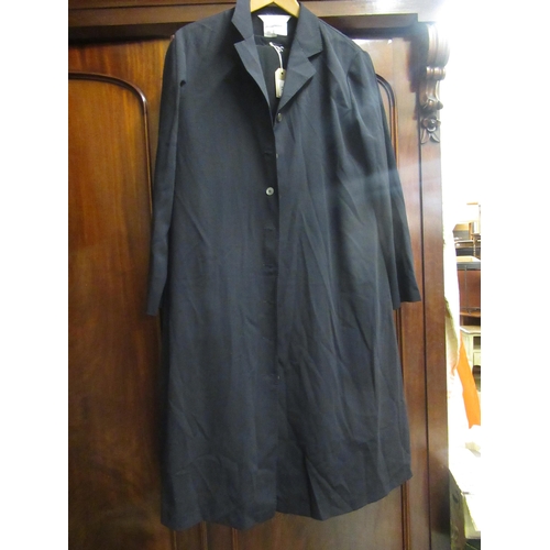 32 - Max Mara black jacket, size 16, together with a pair of matching trousers, two other Max Mara dresse... 