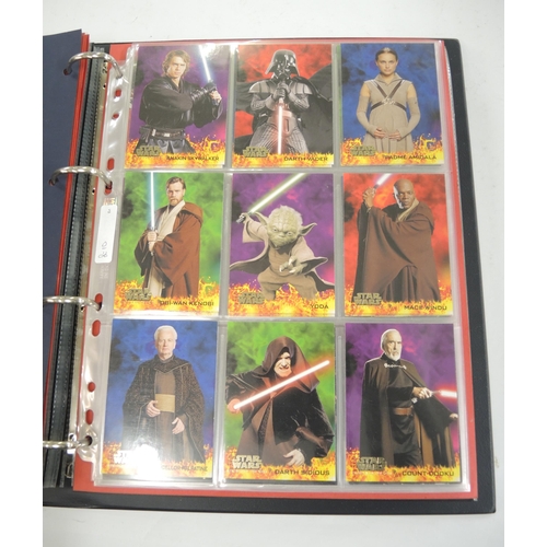 321 - Five albums of trading cards, including Merlin, Pog, Skybox, Vertigo, Top Trumps, Topps, Star Wars a... 