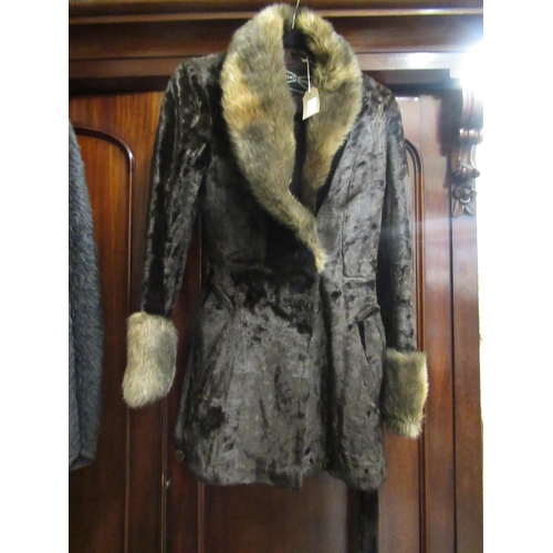 34 - 1960's Leather mini dress, together with two simulated fur coats