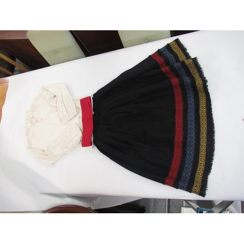 36 - Traditional Mexican skirt, top and belt, together with a Tyrolean skirt and three various hats in tw... 