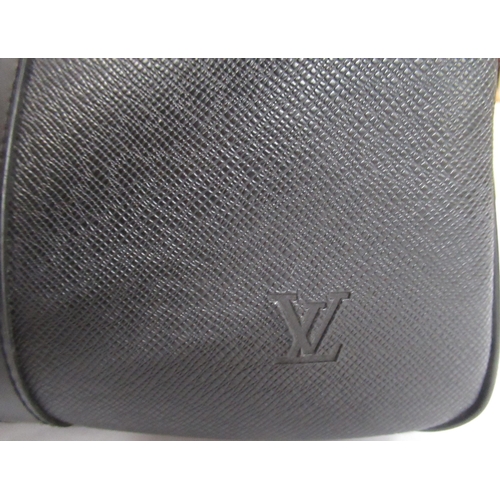 42 - Louis Vitton black leather holdall and wash bag