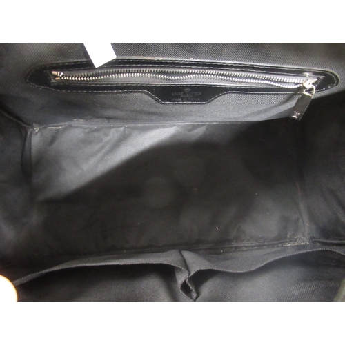 42 - Louis Vitton black leather holdall and wash bag